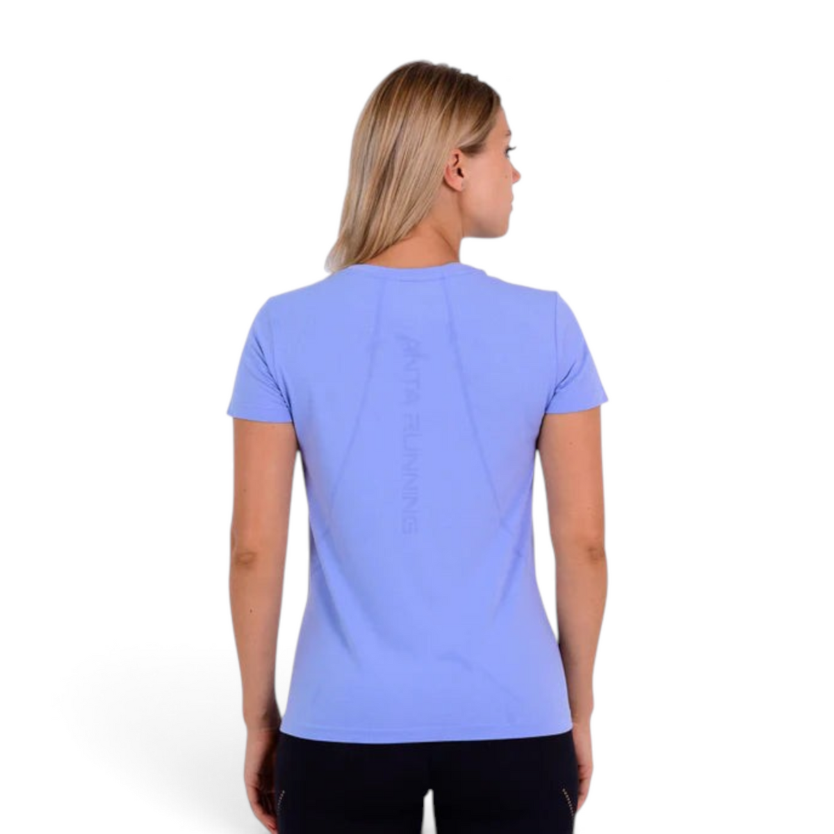 FRG light purple short-sleeve athletic T-shirt worn by a woman, back view with reflective running logo detail