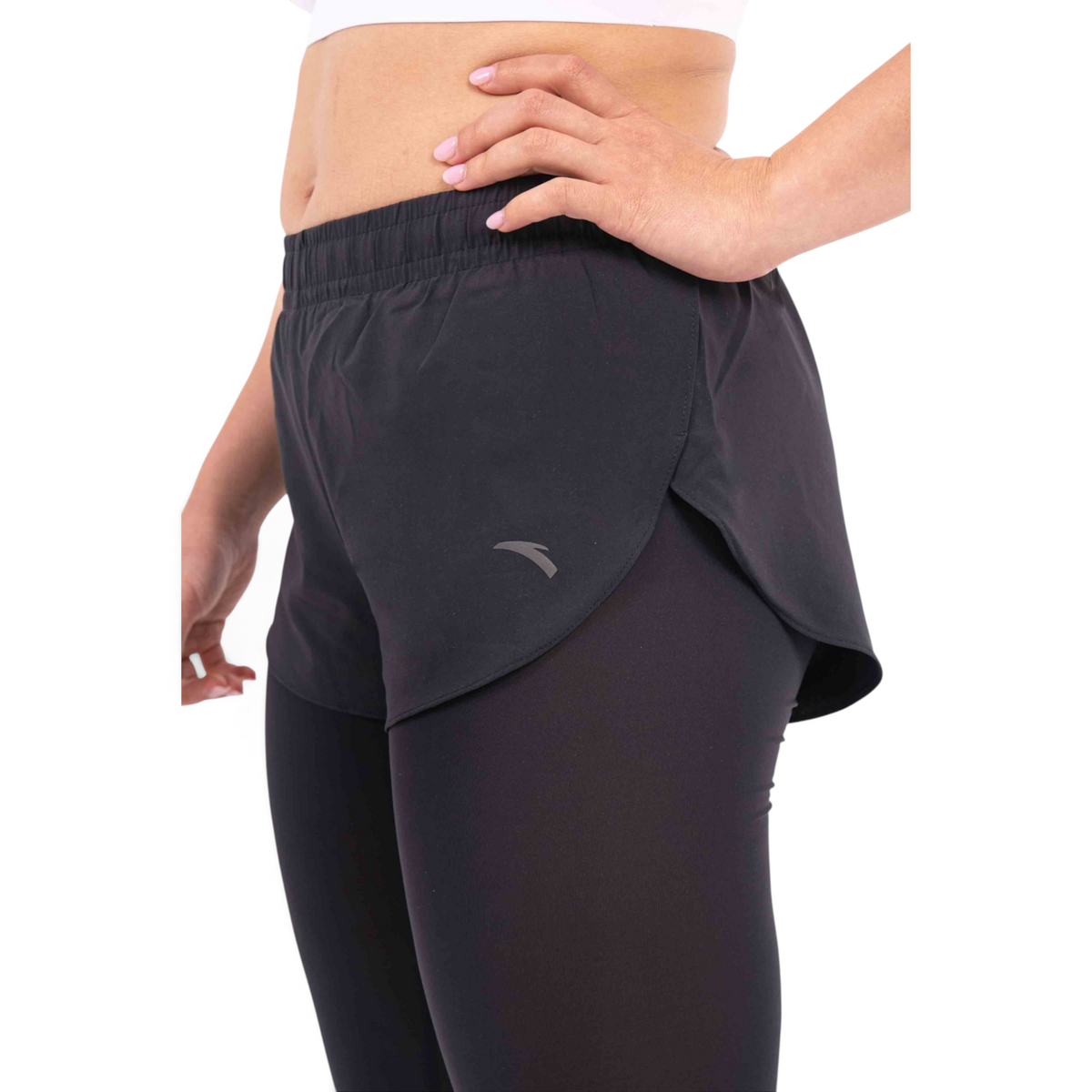 FRG black polyester athletic shorts with built-in leggings, featuring a regular fit and side curved hem detail.