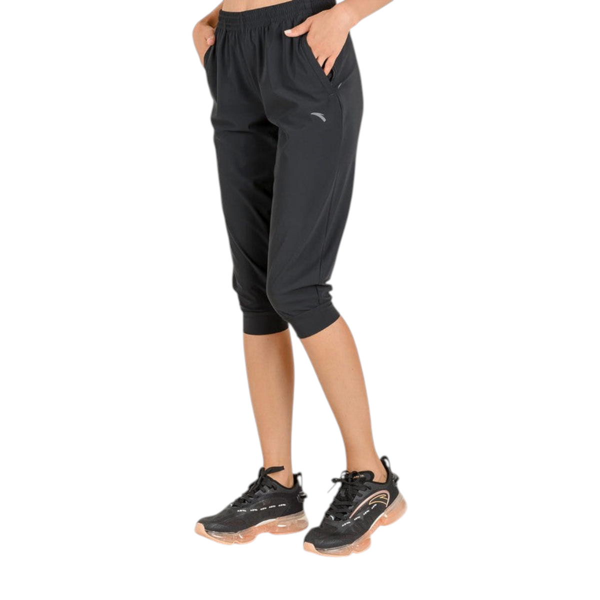 FRG ANTA black 3/4 length knit capri pants with elastic waistband and side pockets worn by a model