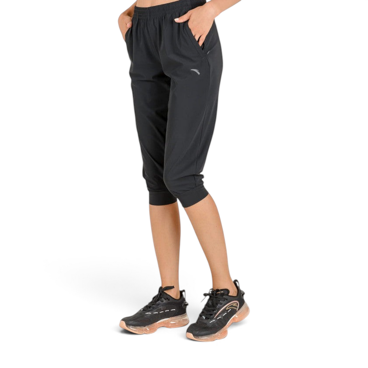 FRG ANTA black 3/4 length knit capri pants with elastic waistband and side pockets worn by a model