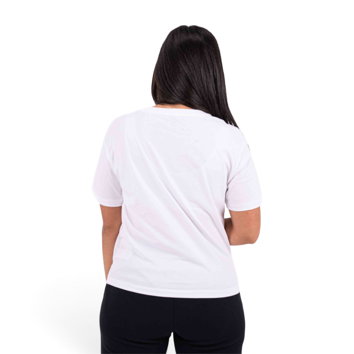 Back view of a woman wearing a plain white FRG T-shirt paired with black leggings against a white background.