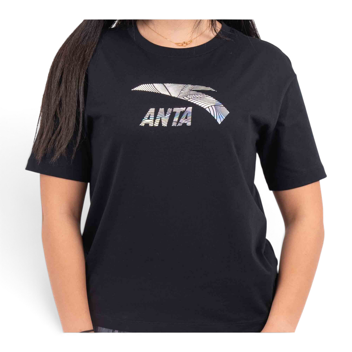 FRG black cotton t-shirt featuring a white ANTA logo with a unique striped graphic design worn by a woman