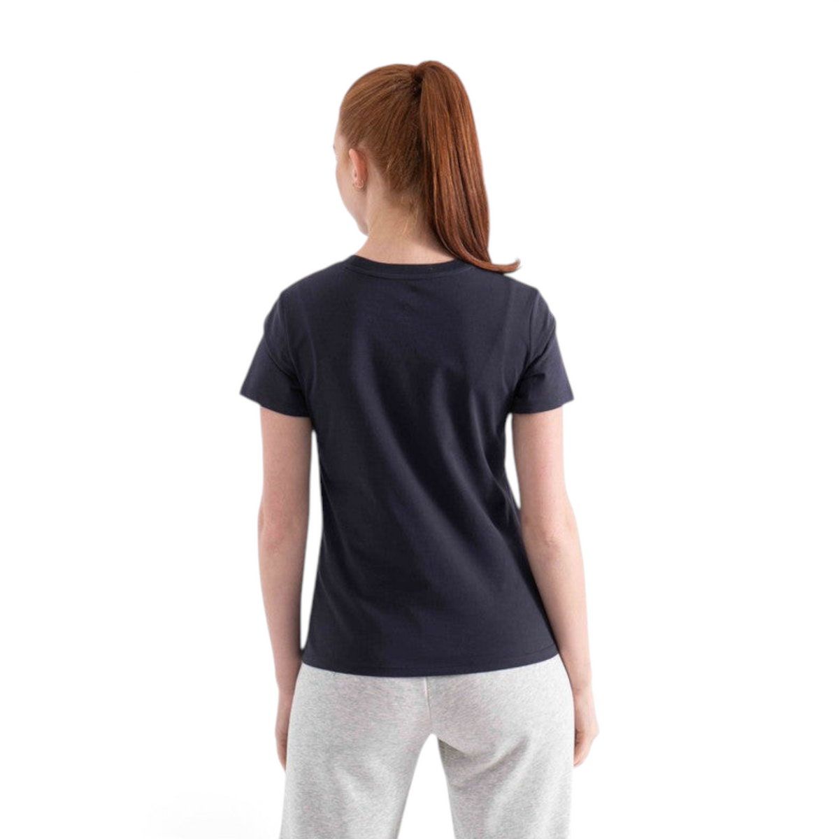 Back view of a woman wearing a regular fit FRG navy blue cotton-blend t-shirt against a white background.