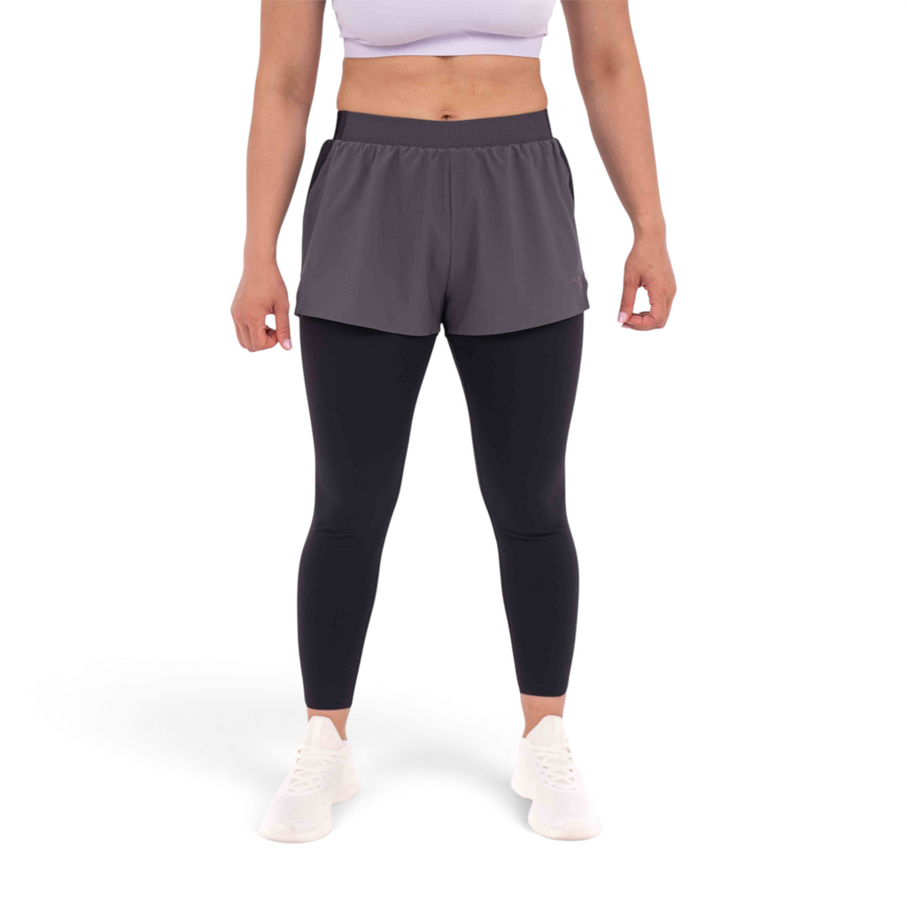 FRG slim fit track pants featuring grey athletic shorts layered over black leggings made of polyester and spandex