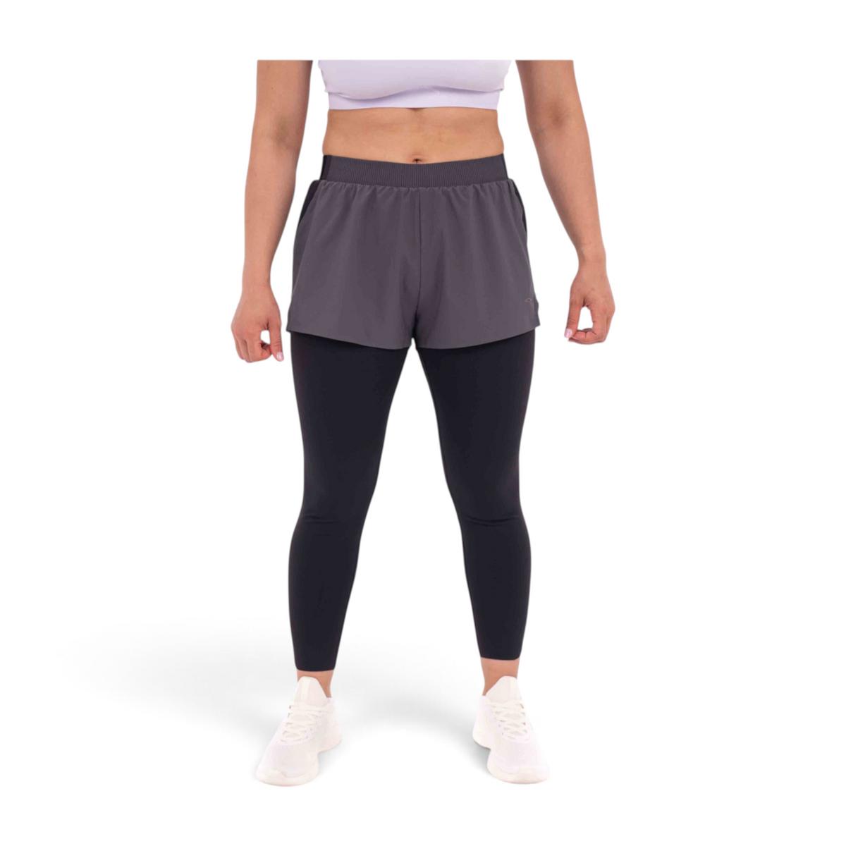 FRG slim fit track pants featuring black leggings layered under grey athletic shorts made of polyester and spandex