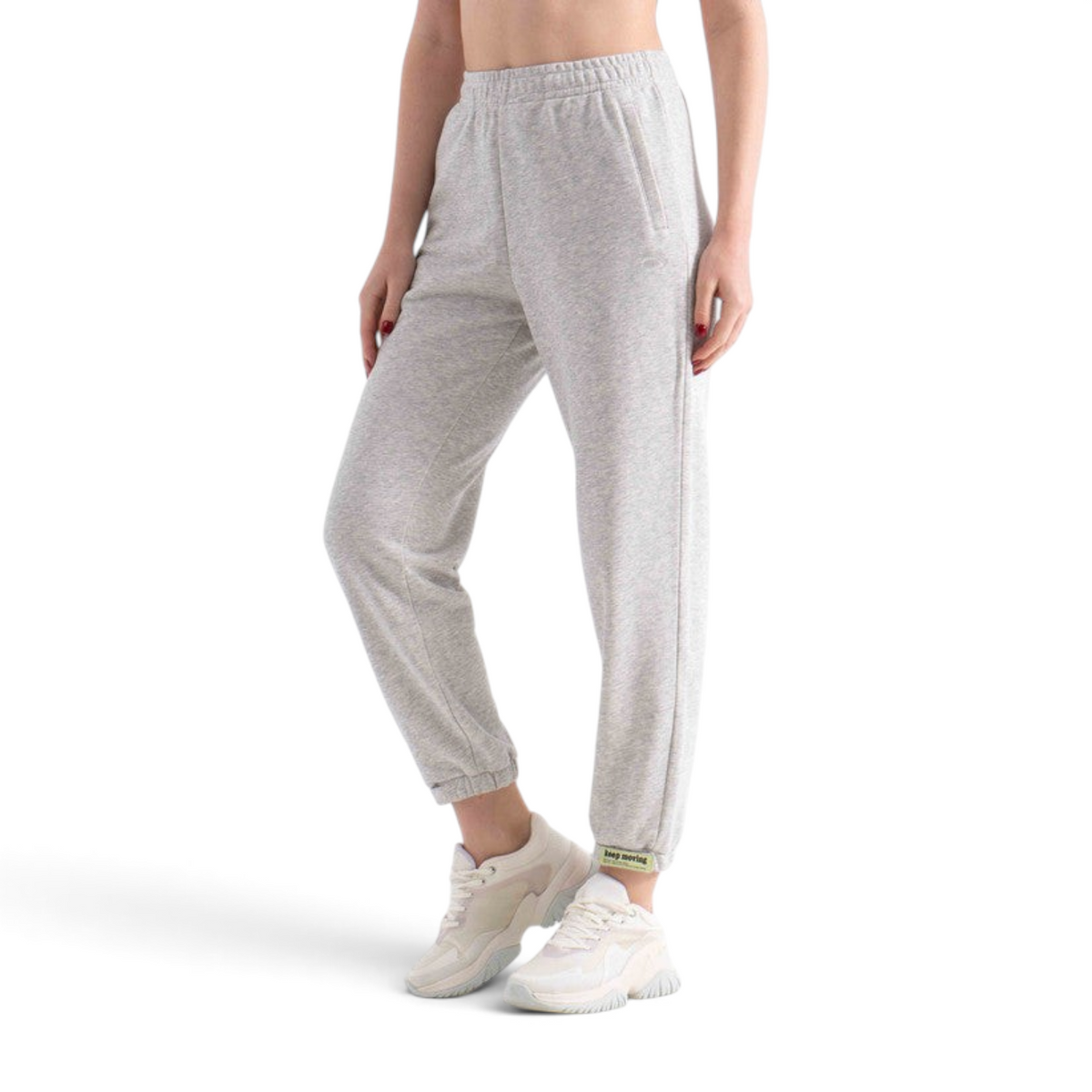 FRG knit track pants in light grey with an elasticated waistband and cuffed ankles worn by a model