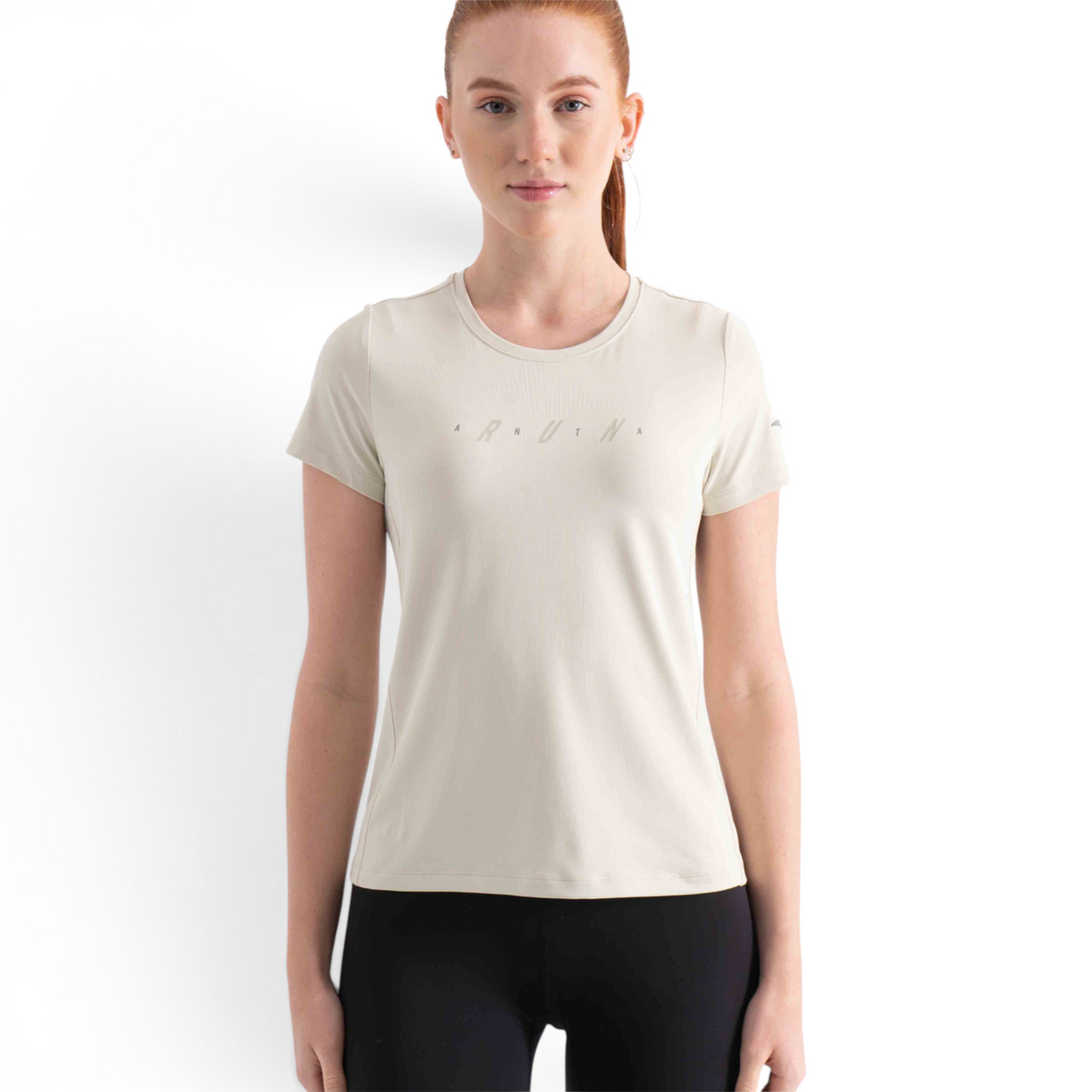 FRG beige short sleeve crew neck t-shirt with subtle chest branding worn by a woman against a white background