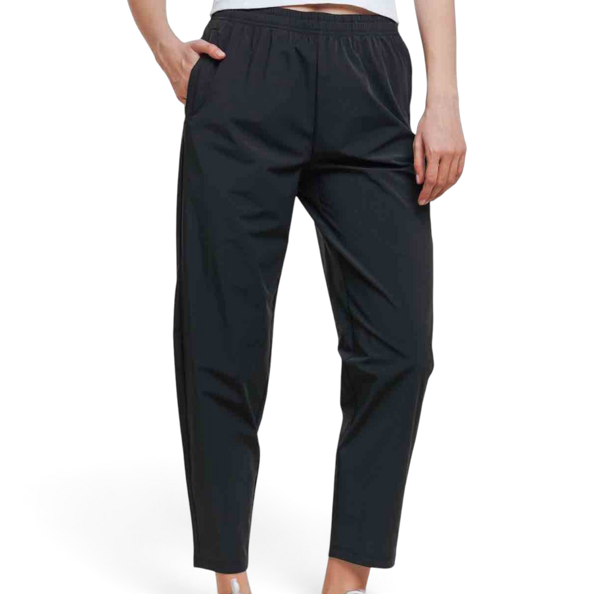 FRG black ankle pants with an elastic waistband and side pockets worn by a model
