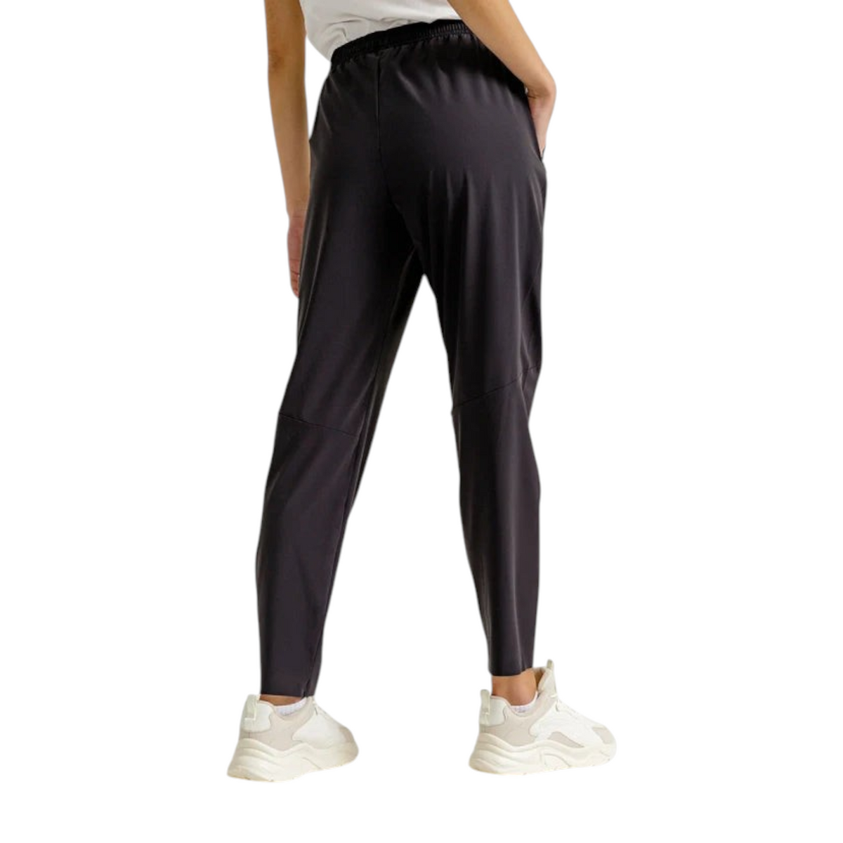 FRG ANTA A-Cool black ankle pants on a model, showing a back view of the lightweight, stretchy athletic trousers.