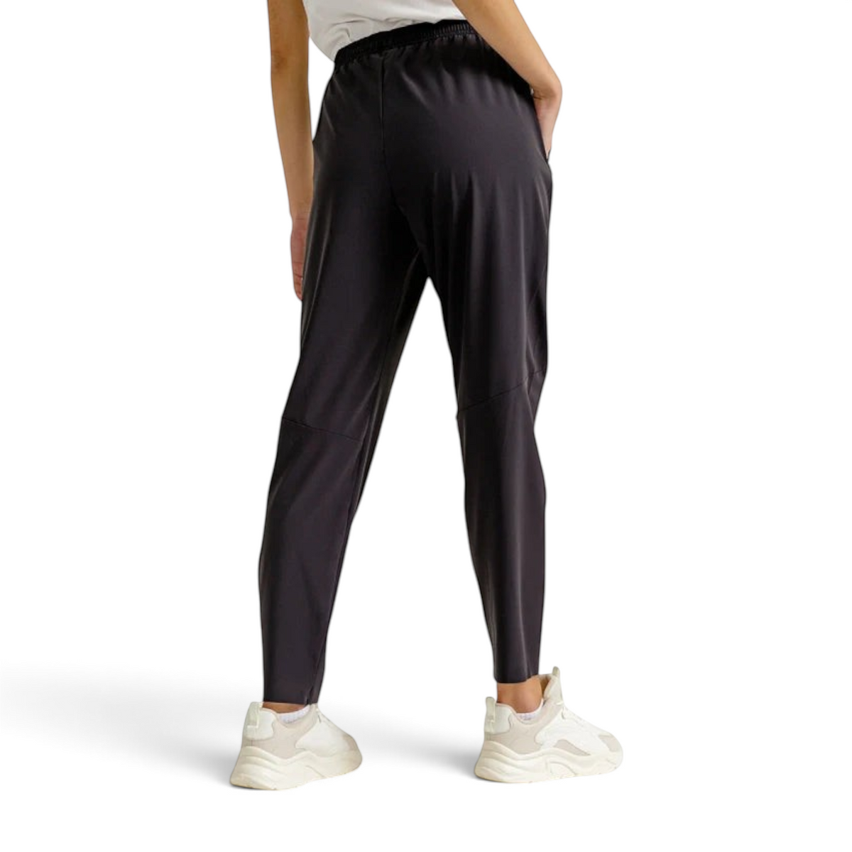 FRG ANTA A-Cool black ankle pants on a model, showing a back view of the lightweight, stretchy athletic trousers.