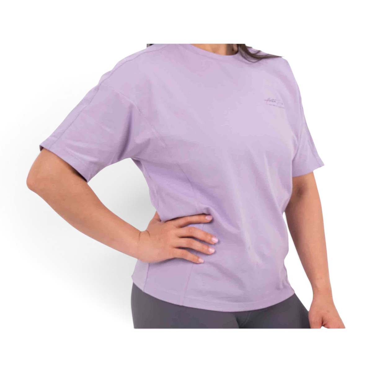 FRG short sleeve lavender t-shirt with a relaxed fit and subtle chest logo on a model