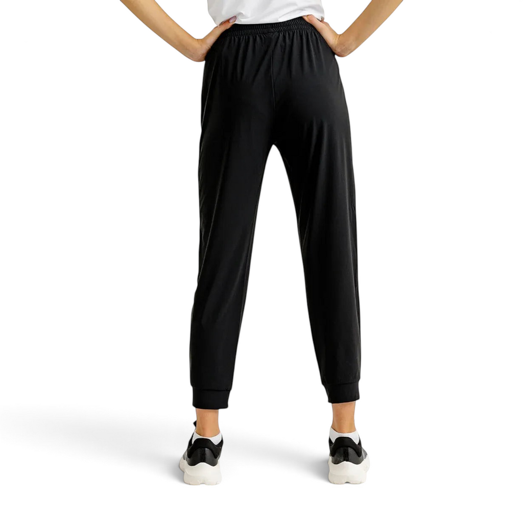 FRG black knit ankle pants featuring a comfortable elastic waistband and cuffed hems, shown from the back view.