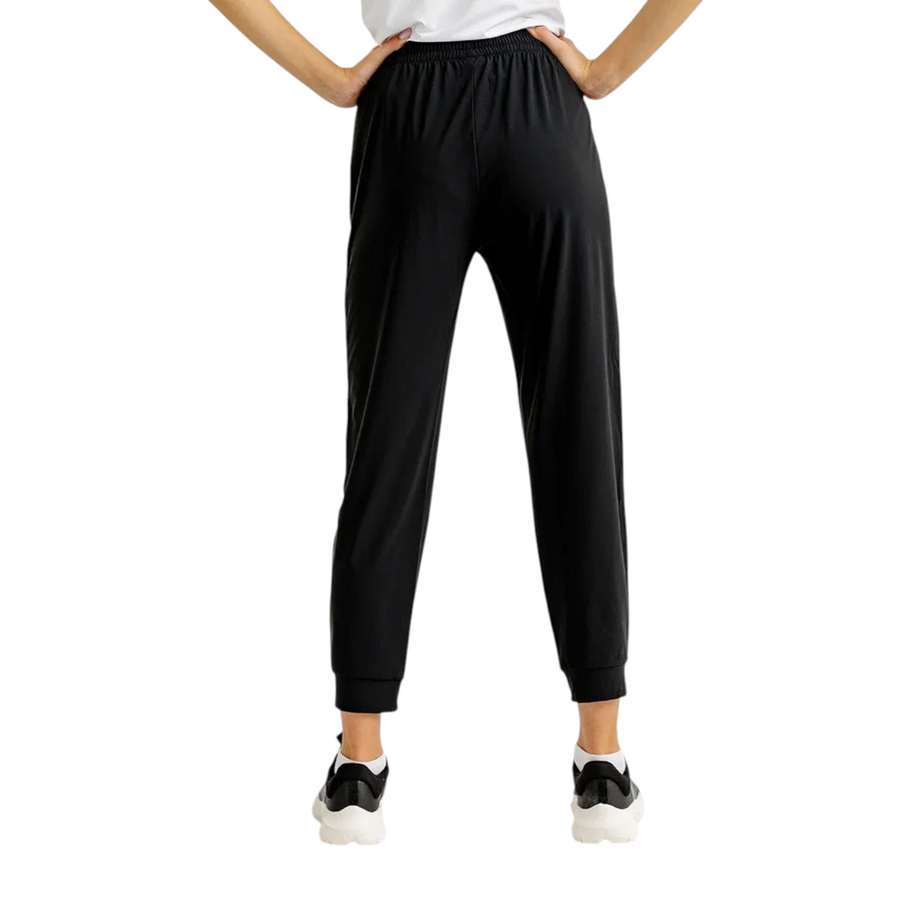 FRG black knit ankle pants featuring a comfortable elastic waistband and cuffed hems, shown from the back view.