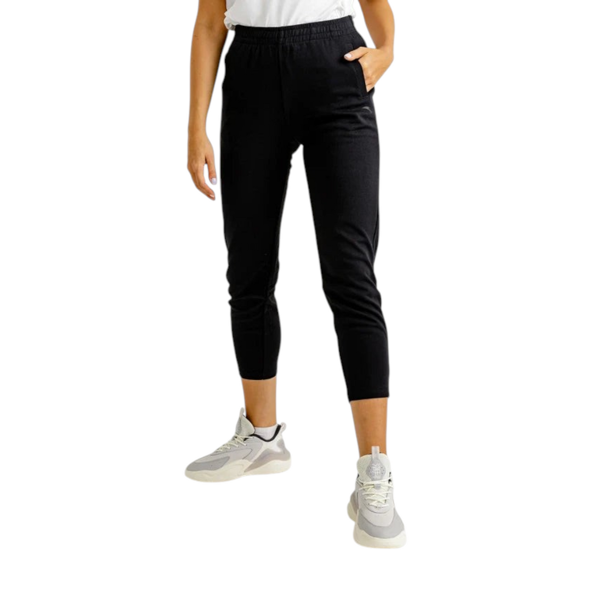 FRG Anta black straight-leg knit cross training pants with elastic waist and zippered pockets on a model