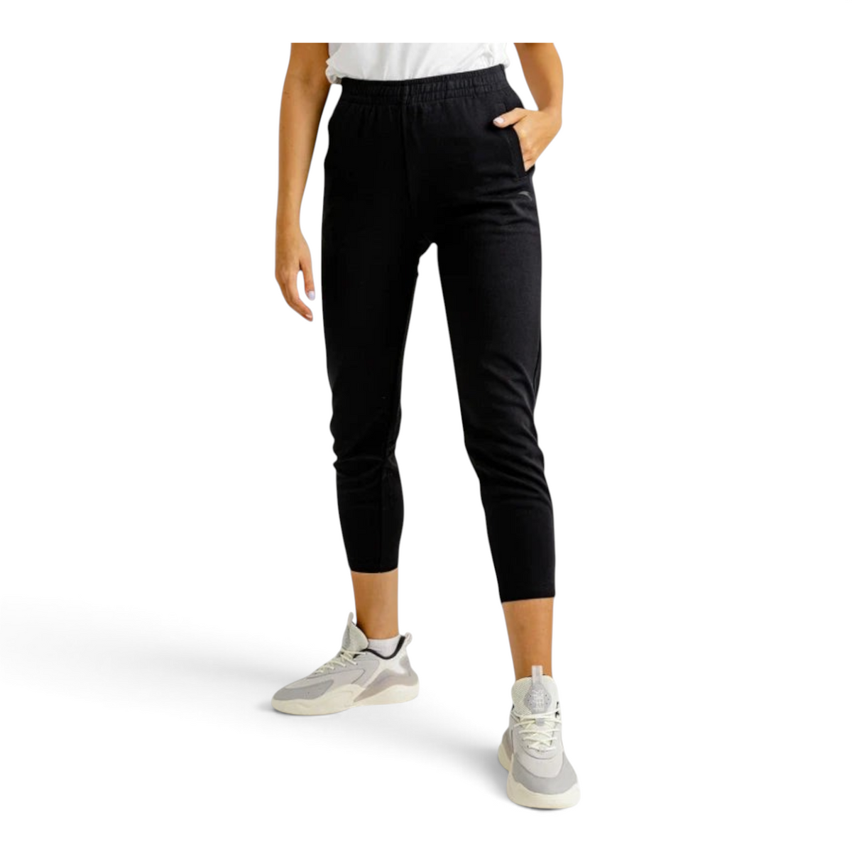 FRG Anta black straight-leg knit cross training pants with elastic waist and zippered pockets on a model