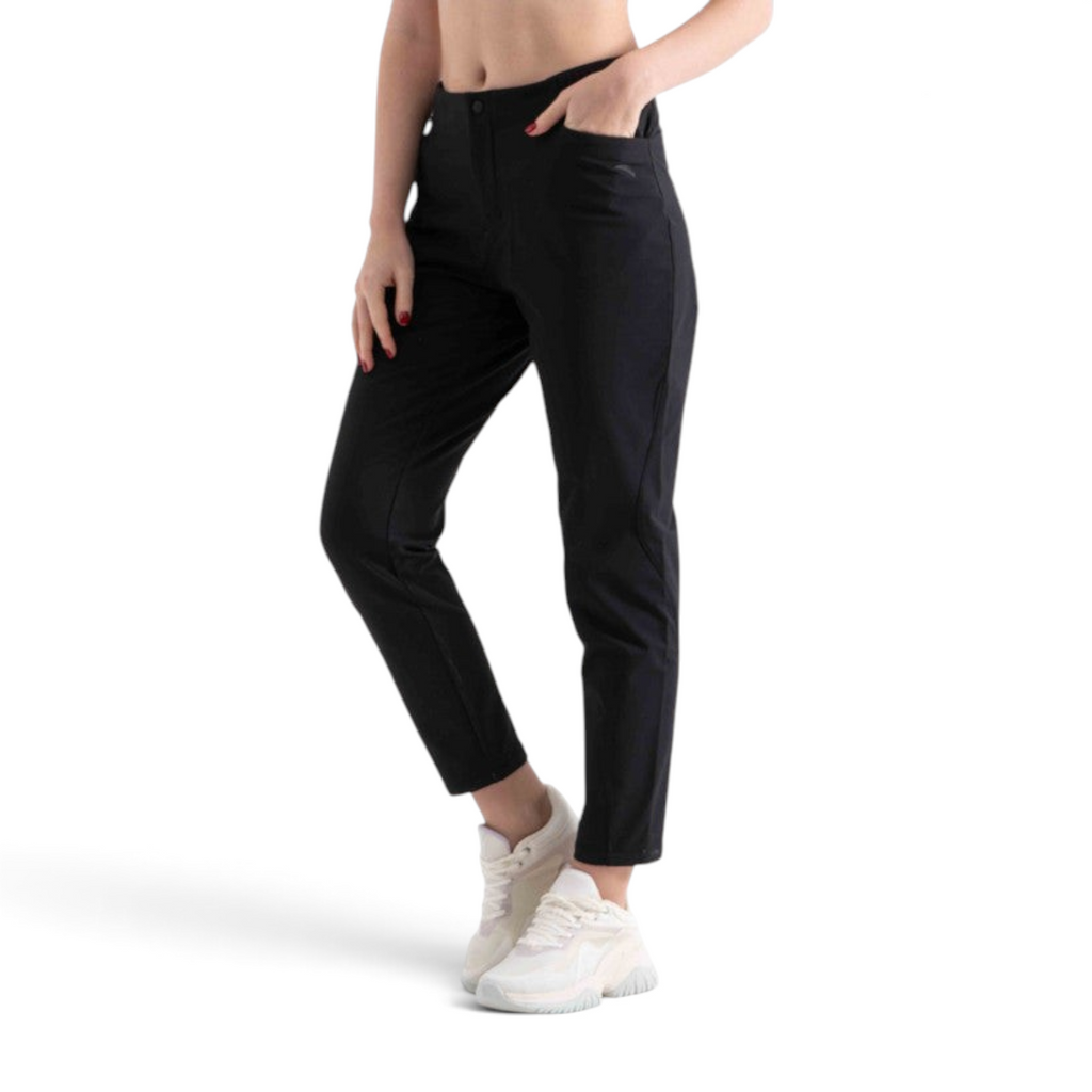 FRG women's black woven track pants for cross training, featuring a slim fit and side pockets on a model