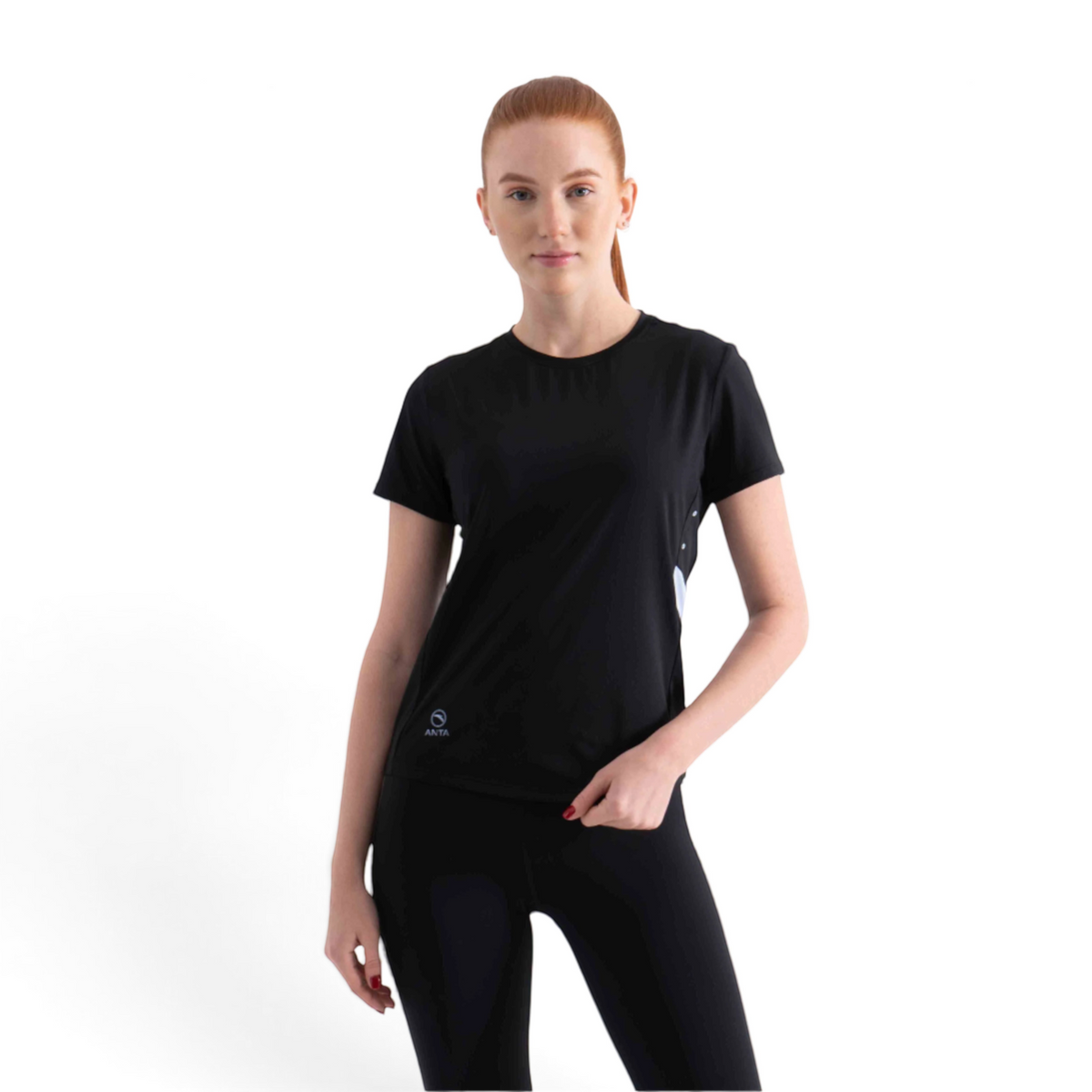 FRG SS TEE black short sleeve athletic shirt worn by a woman with red hair against a white background