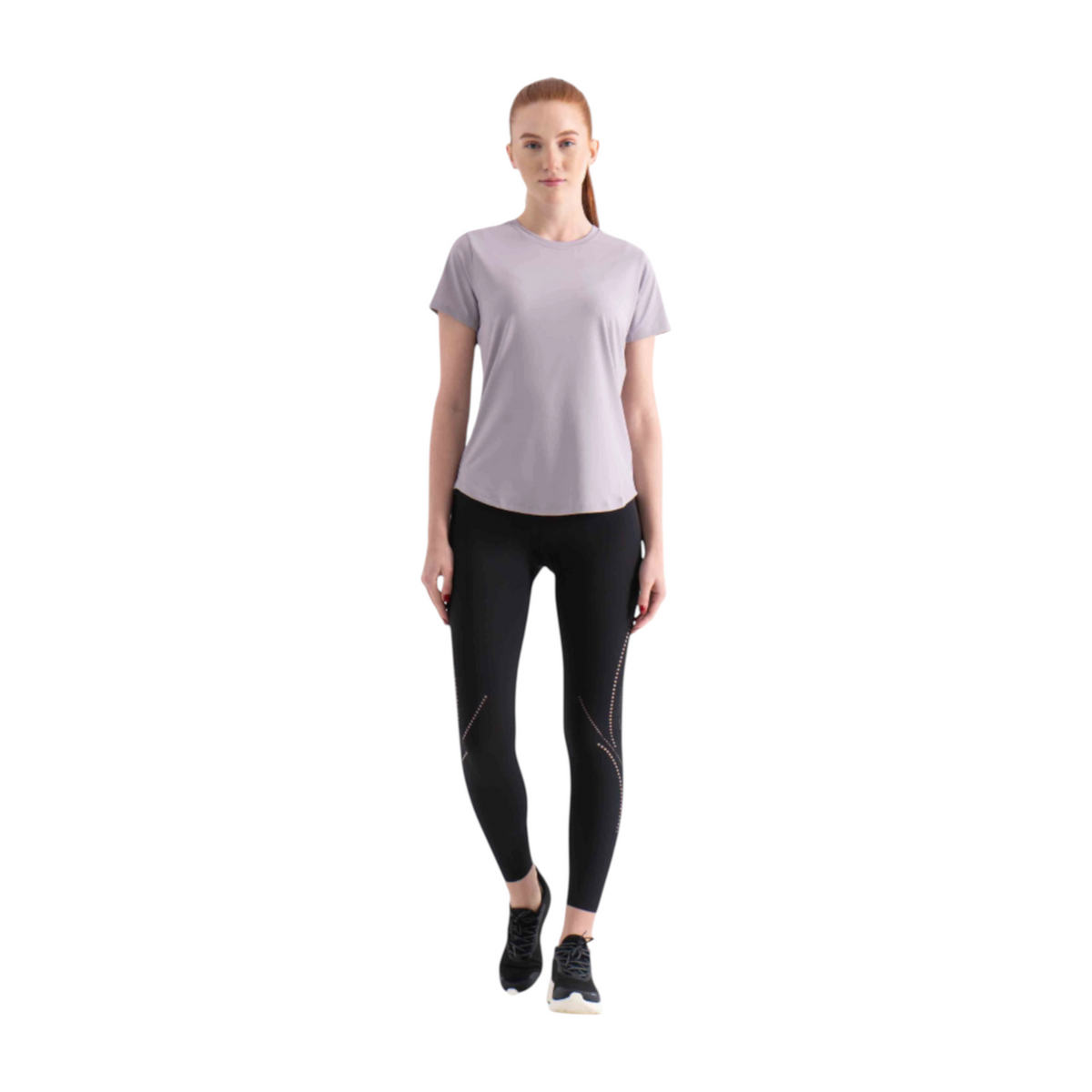 FRG short sleeve tee in light grey worn by a woman with black athletic leggings and sneakers