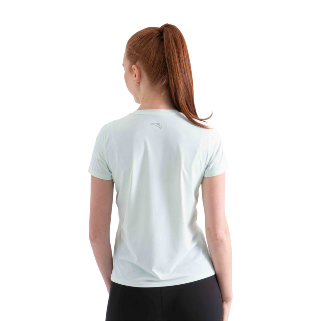 Back view of a woman wearing a light mint green FRG short sleeve athletic tee with a small logo on the upper back.