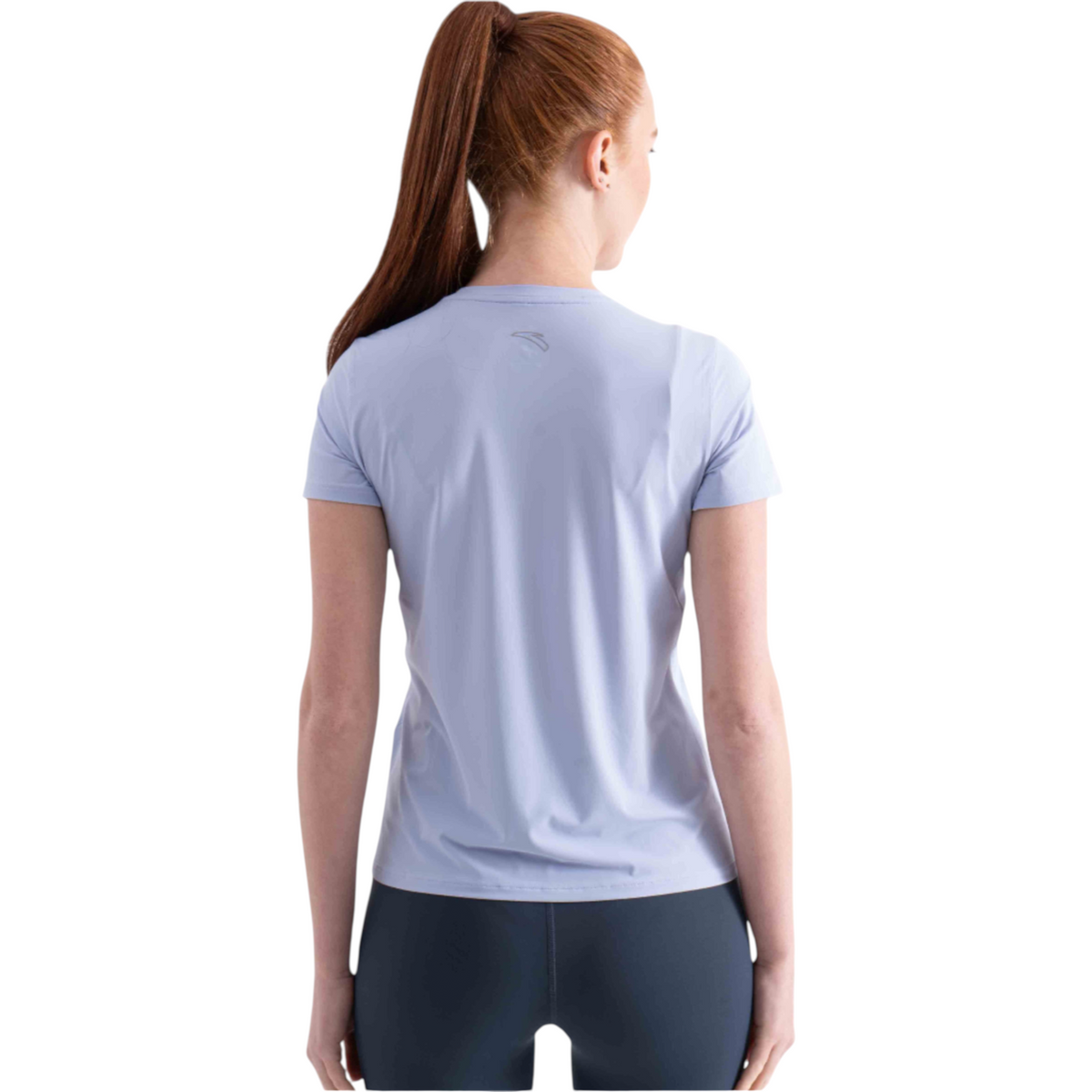 Back view of a woman wearing a light blue FRG short sleeve athletic t-shirt with a small logo on the upper back