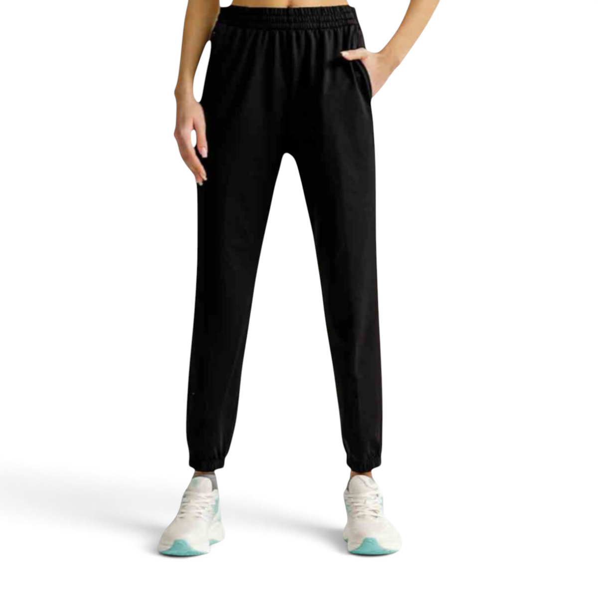FRG black knit track pants with an elastic waistband, side pockets, and cuffed ankles worn by a model