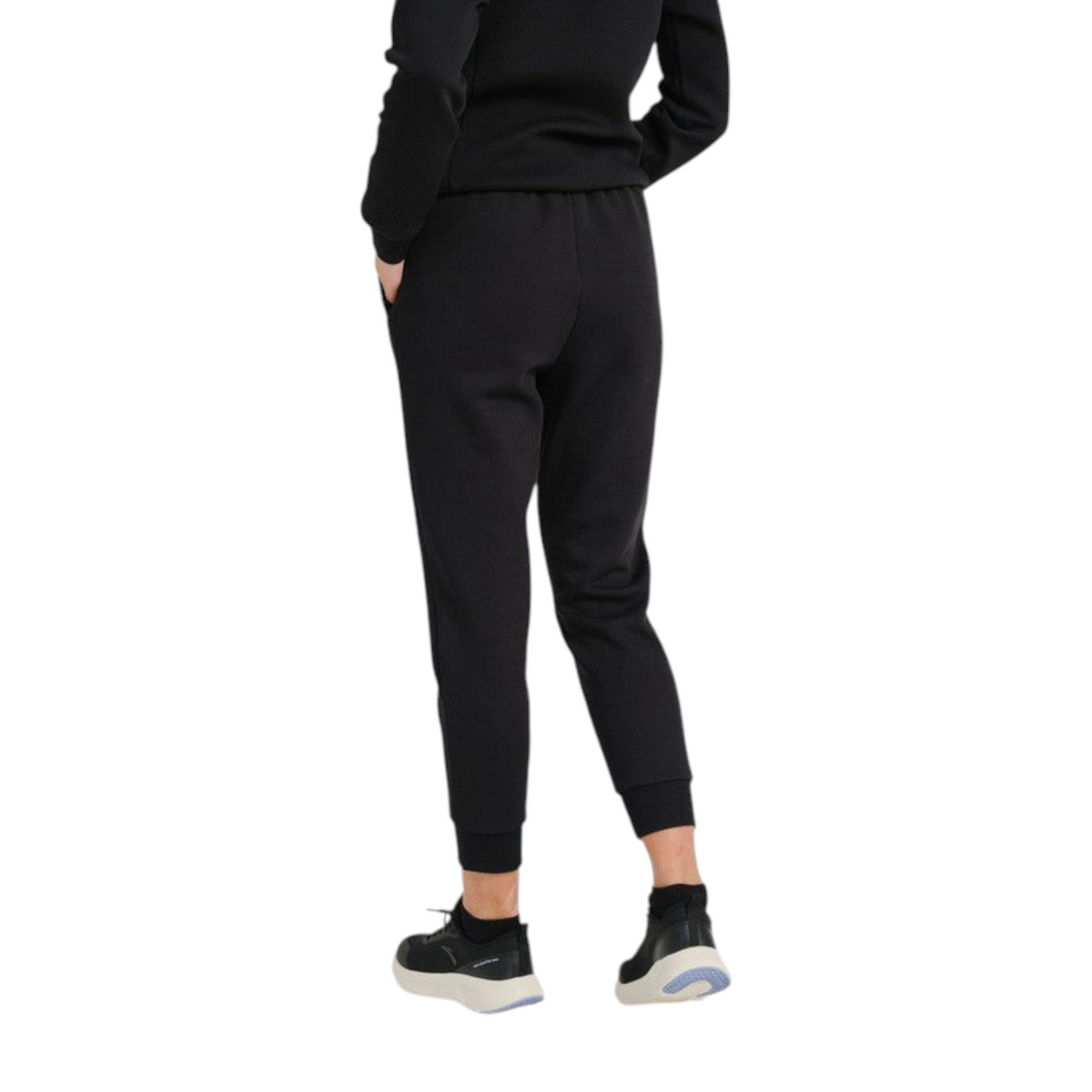 FRG ANTA A-Sports Shape black knit ankle pants worn by a model, showing a back view of the tapered athletic fit.