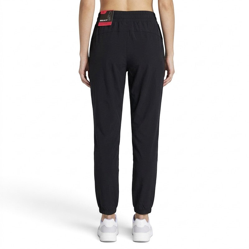 FRG ANTA black knit ankle pants with a flexible nylon-spandex blend, shown from the back view.