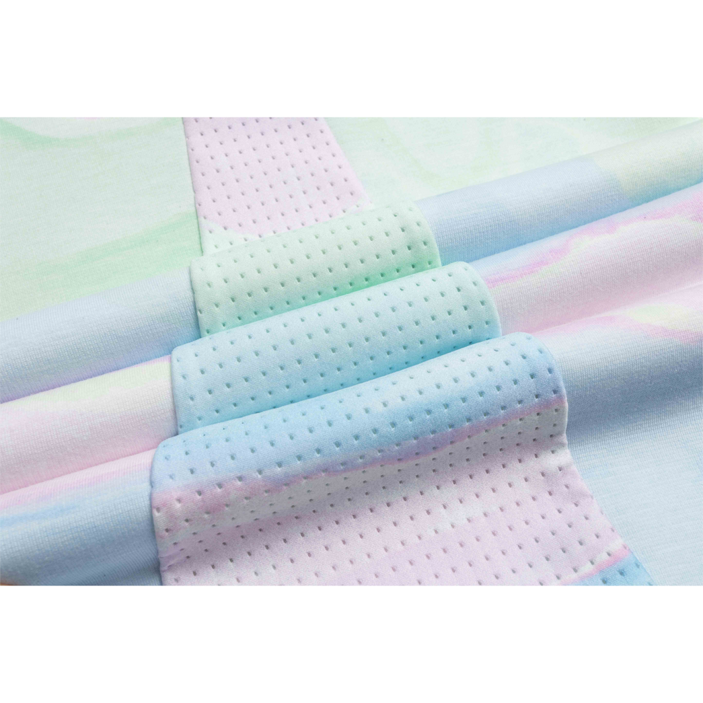 FRG SS TEE featuring a pastel tie-dye pattern with perforated breathable fabric panels in a soft layered design.