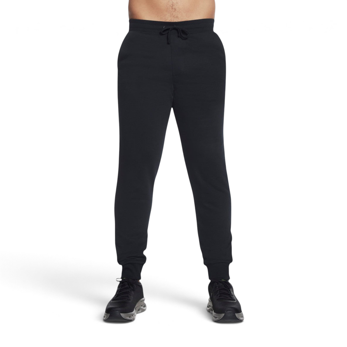 FRG SKECH-SWEATS ESSENTIAL JOGGER in black with a drawstring waist and ribbed cuffs worn by a man