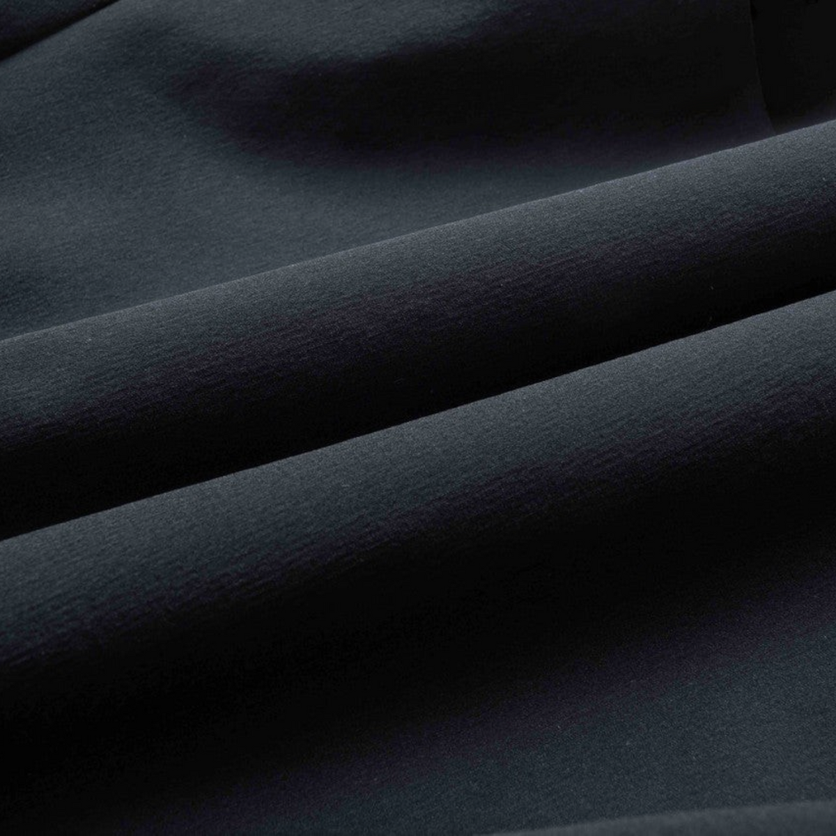FRG ANTA black knit track pants fabric texture showing soft cotton-polyester blend material