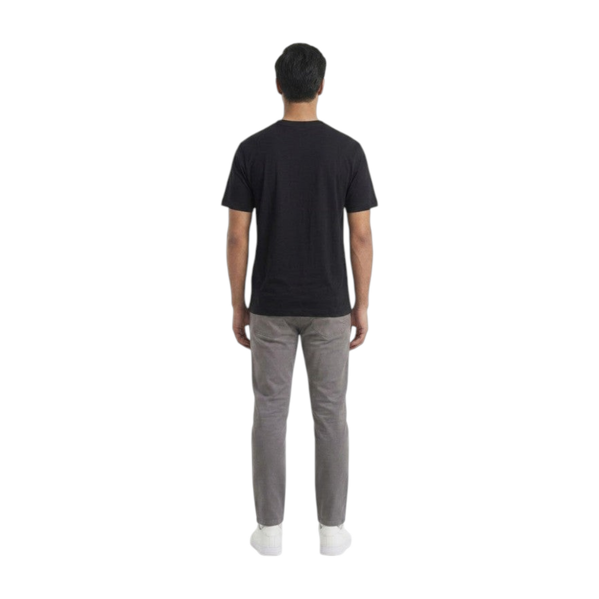 FRG ANTA black short sleeve running t-shirt worn by a man from the back view with grey trousers and white sneakers