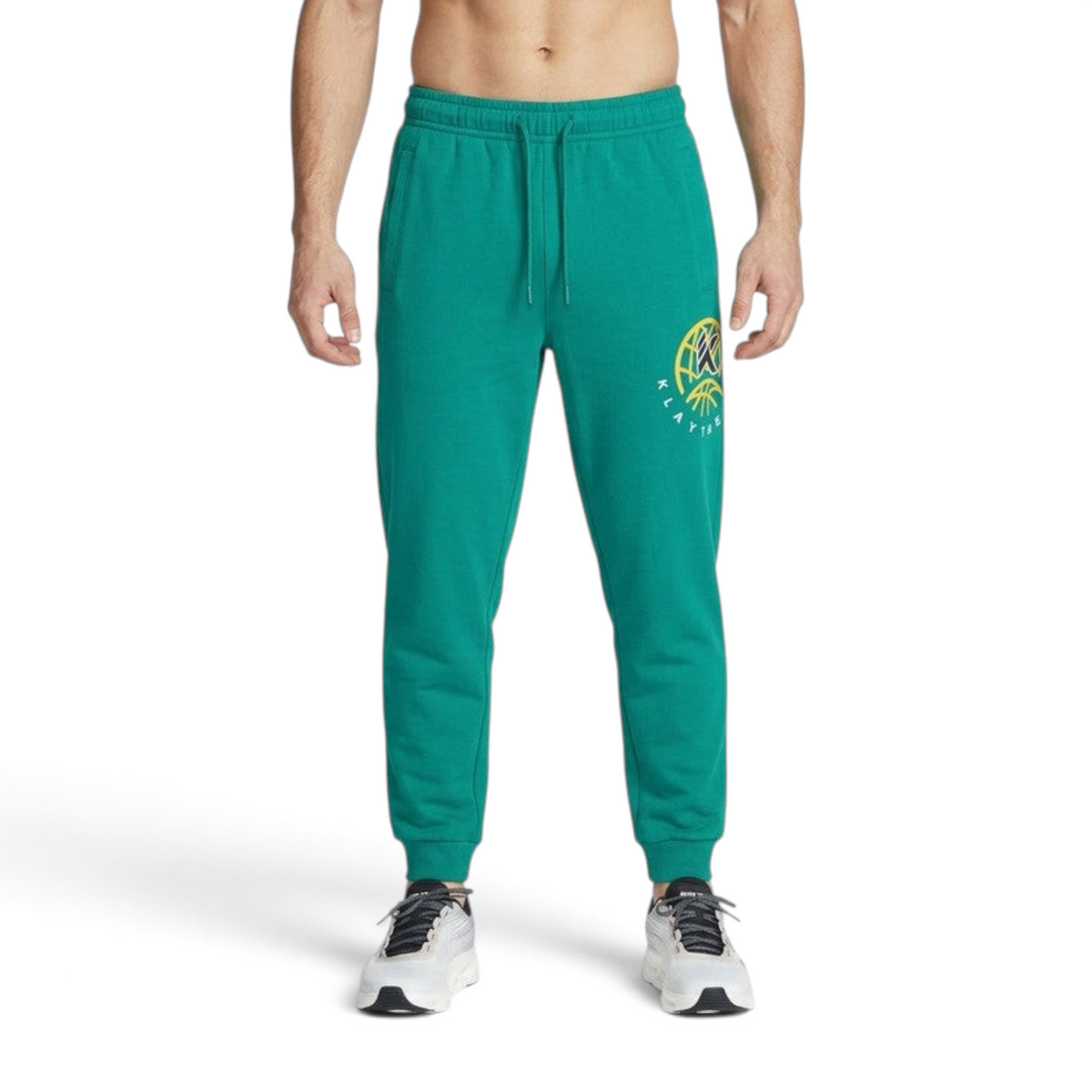 FRG ANTA emerald green basketball knit track pants with drawstring waist and graphic logo detail on the leg.