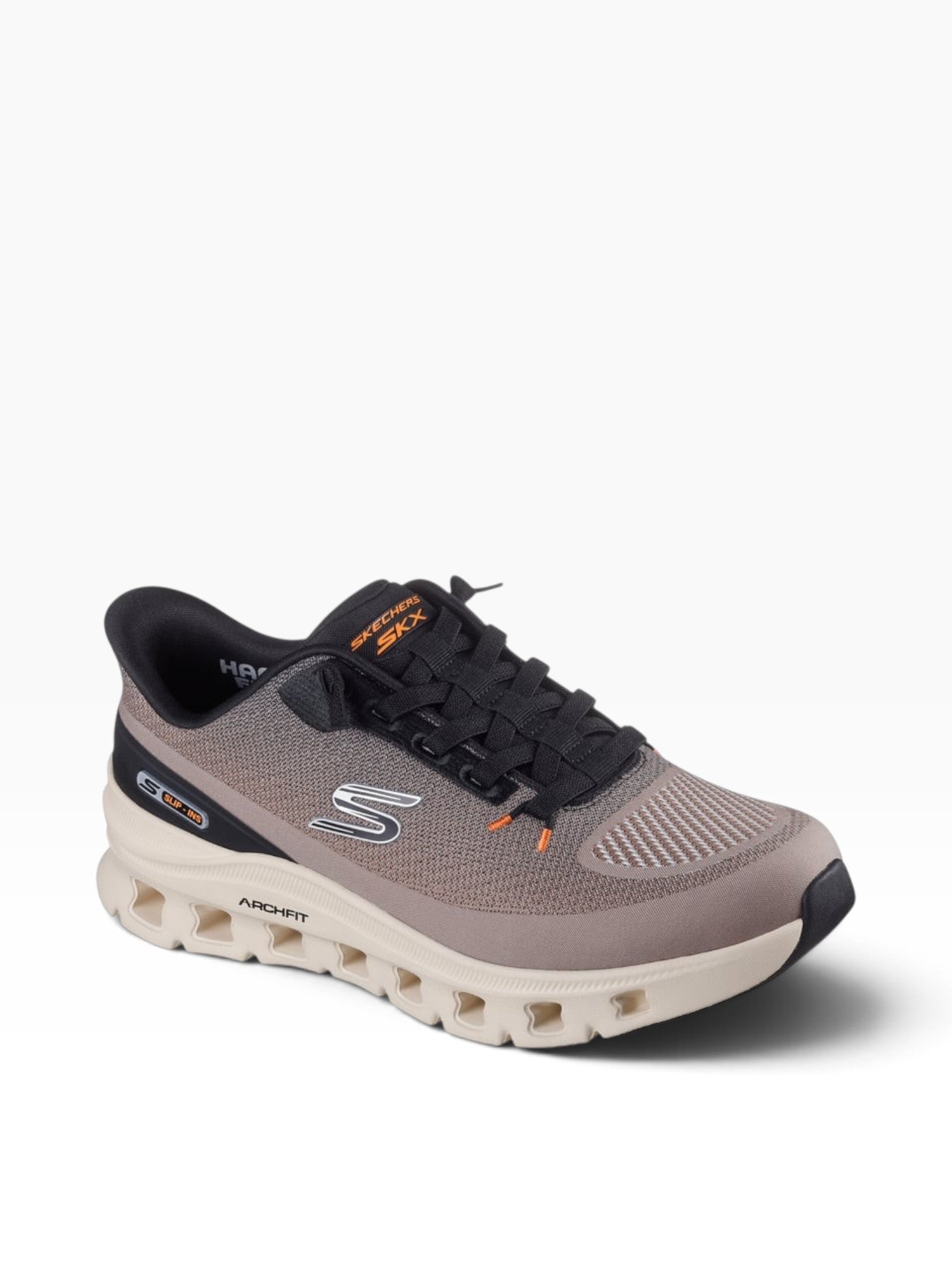 FRG Skechers Arch Fit Glide-Step Pro taupe and black vegan slip-on sneaker with geometric midsole cushioning.