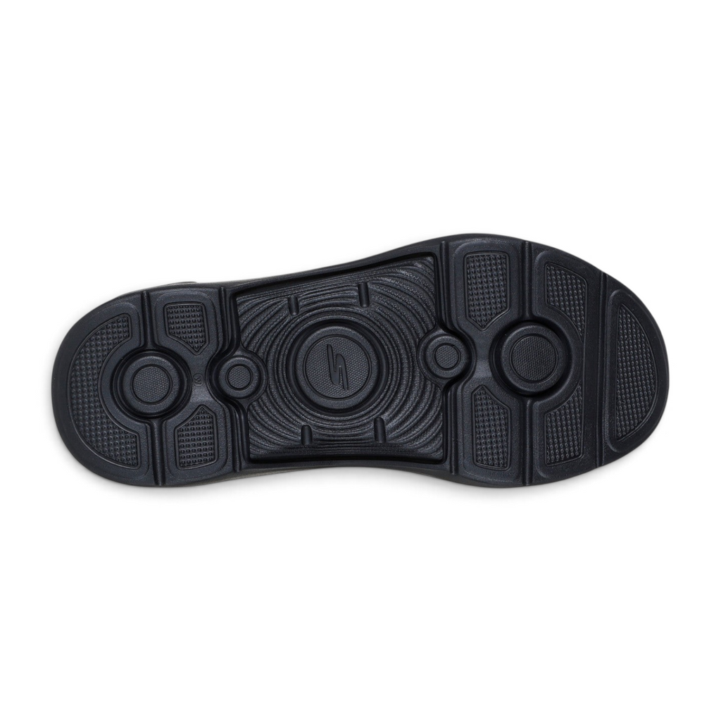 Black rubber outsole of the FRG Skechers GO Walk Arch Fit 2.0 Valencia shoe showing tread pattern and arch support