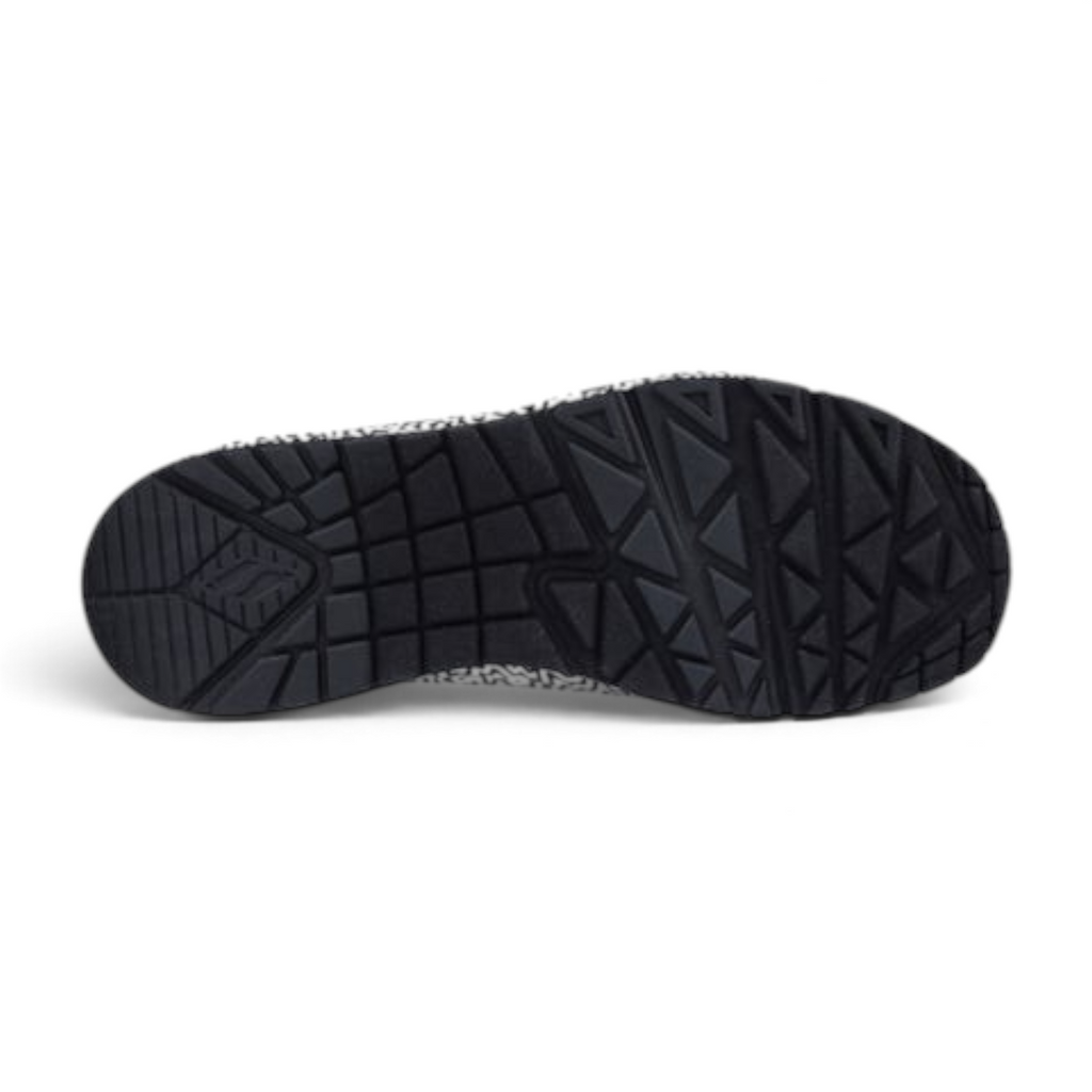 FRG UNO INFINITE DRIP sneaker featuring a black rubber outsole with a geometric tread pattern and patterned sidewall