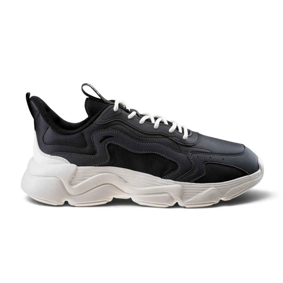 FRG casual shoes in black with white laces and a chunky white platform sole, featuring a sleek synthetic design.