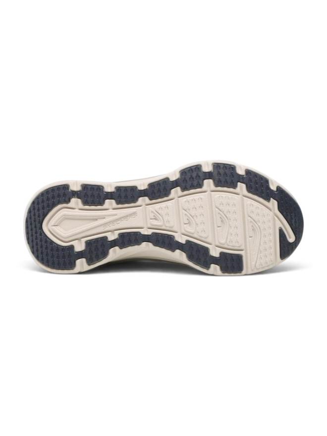 FRG Skechers Relaxed Fit D'Lux Walker New Moment sneaker showing the beige and navy blue textured rubber outsole